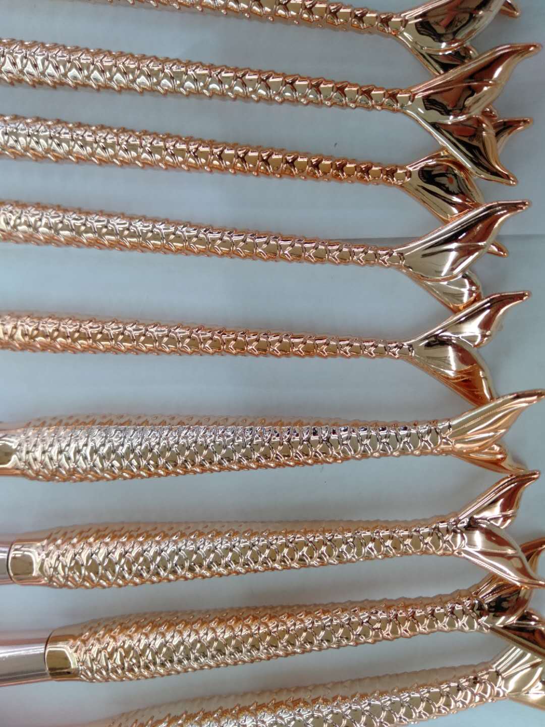 Set of makeup tools: eyeshadow brush, blush brush, eyebrow brush, and loose brush Specification image