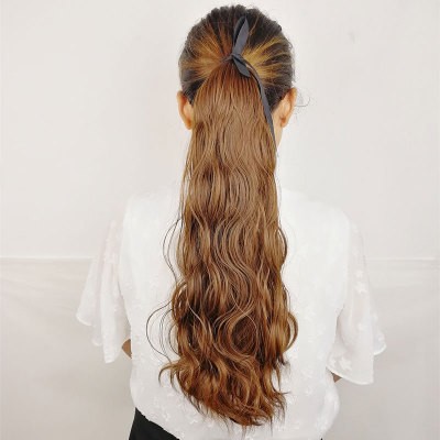 A wig for a woman with a small, corn-trimmed ponytail, a water ripple woolen curly ponytail detail image 3