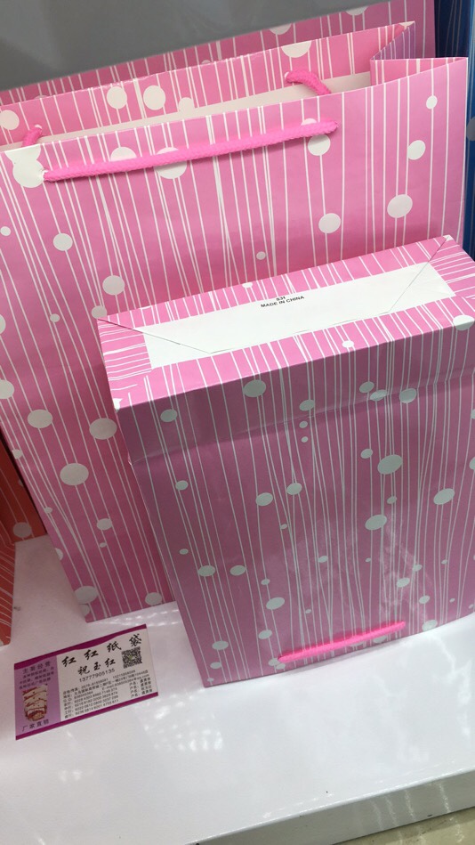 圆点礼品袋，包装袋，购物袋，服装纸袋厂家直销国际商贸城2区21号门6街10446店面详情6