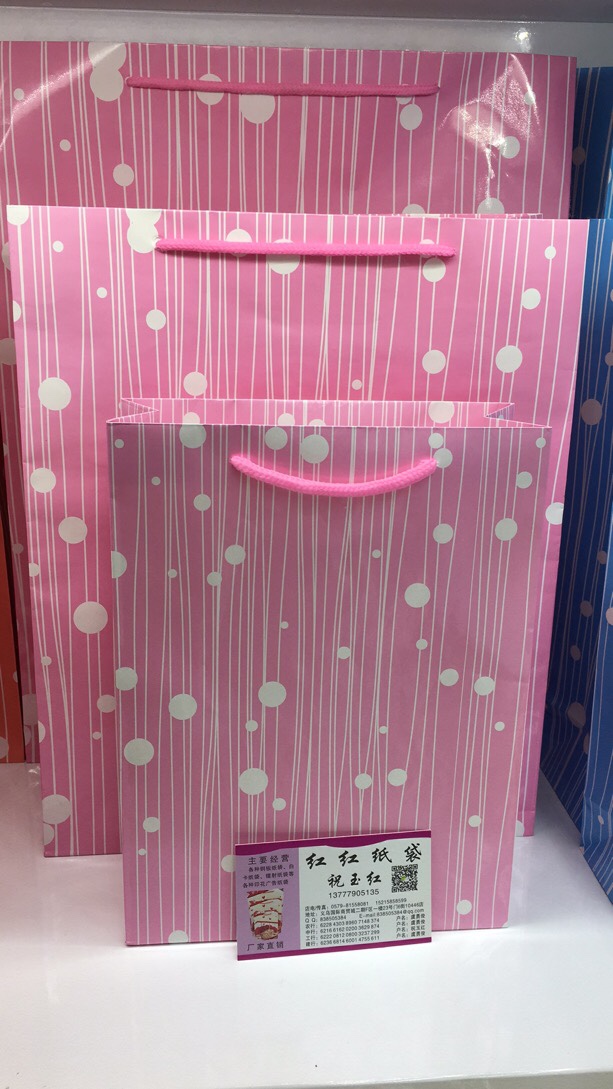 圆点礼品袋，包装袋，购物袋，服装纸袋厂家直销国际商贸城2区21号门6街10446店面详情4