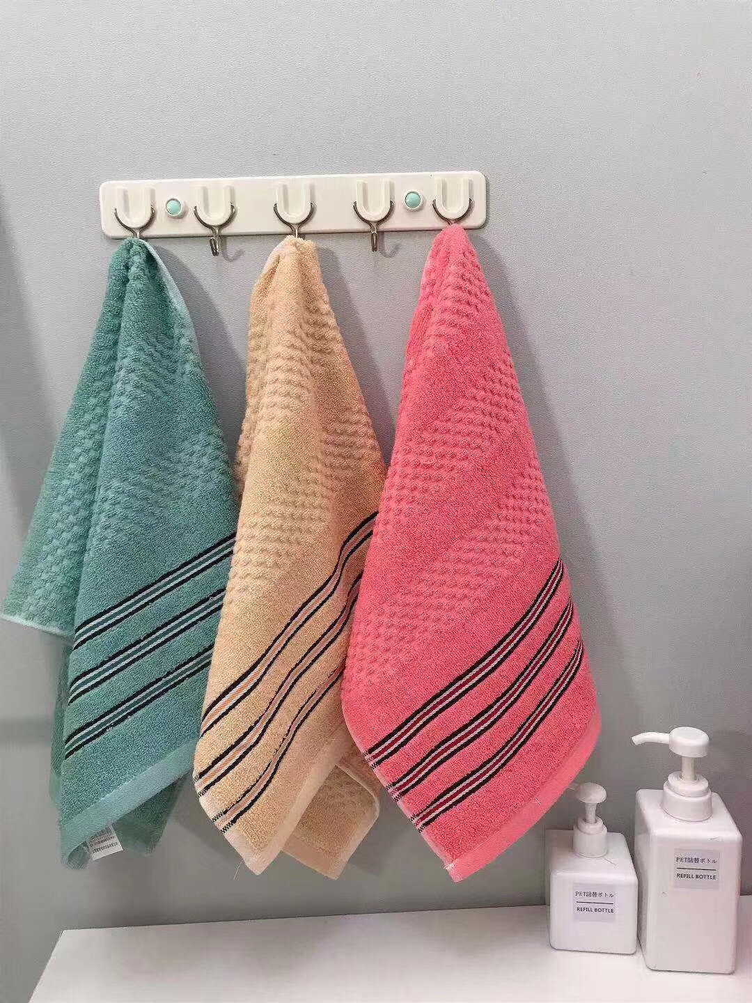 Segmental black striped towel detail image 1