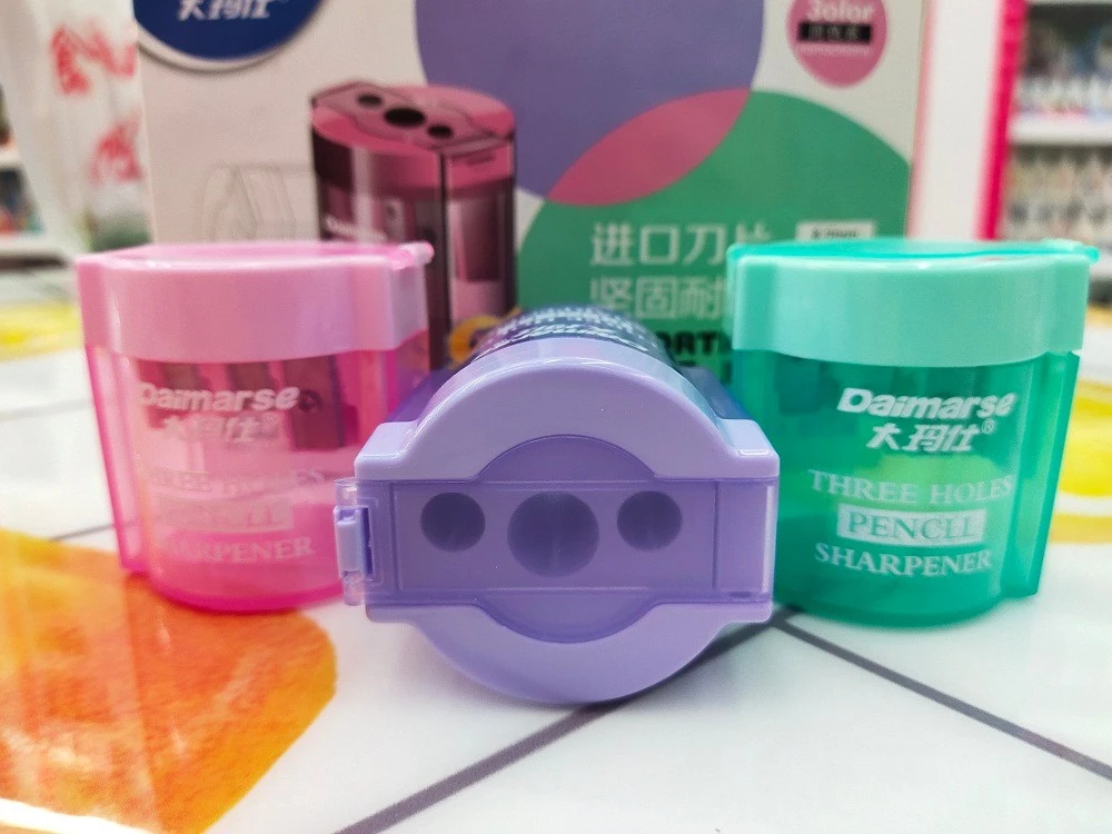 Malaysian 154 three-hole, large and small, three-color mixed pencil sharpener, office and student prize detail image 2