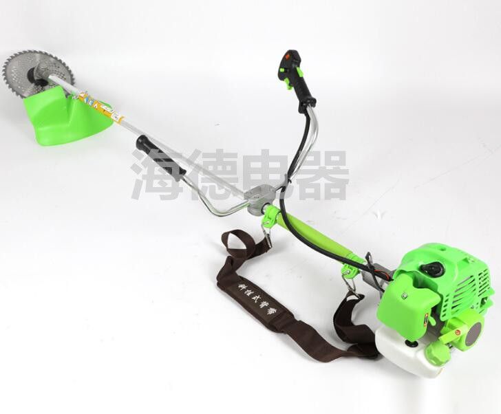 Two punch side hanging mower and irrigation machine Knacker lawn mower and gasoline weeding small lawn harvester and irrigation machine