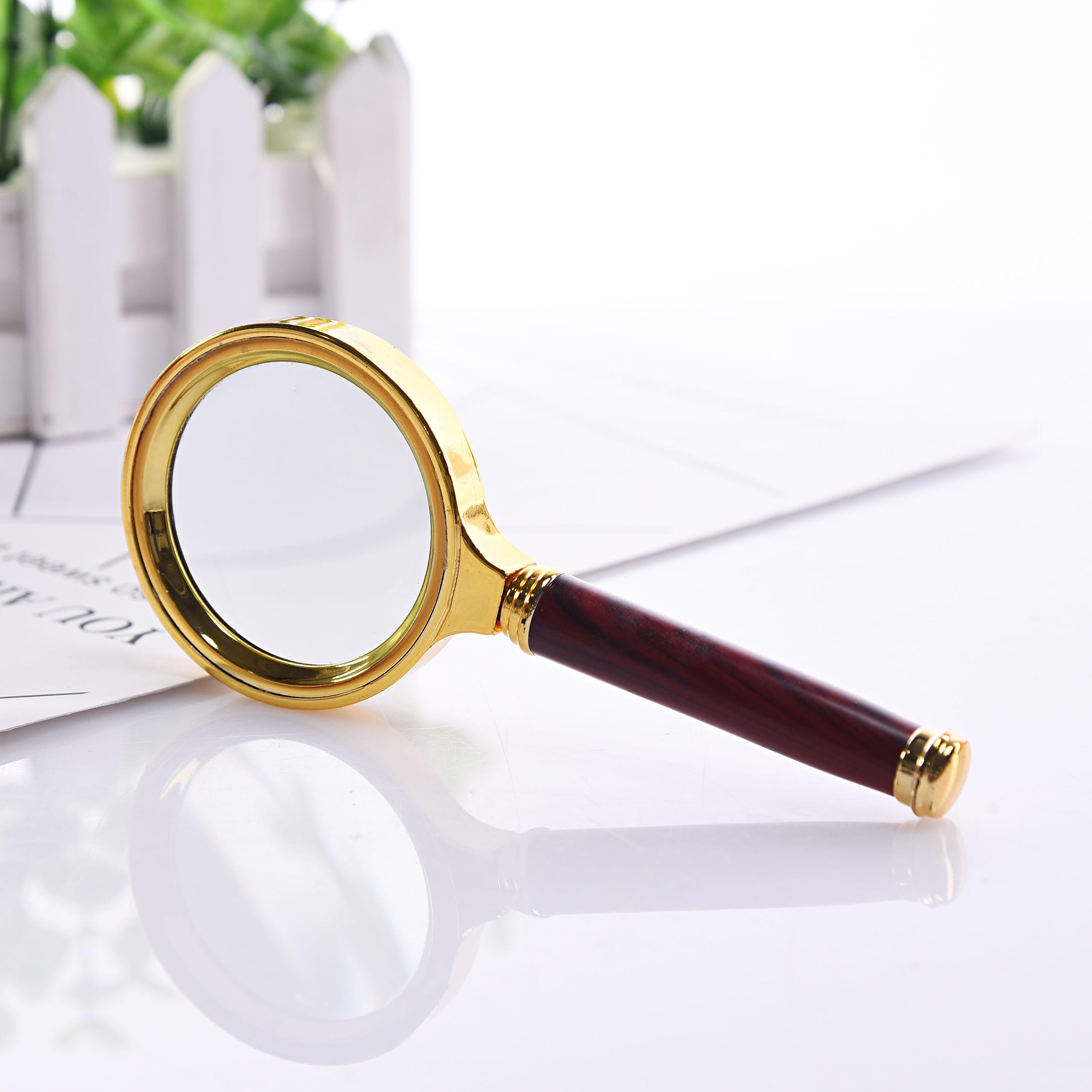 Semi-metal frame glass lens handheld magnifying glass for the elderly Application Scenario