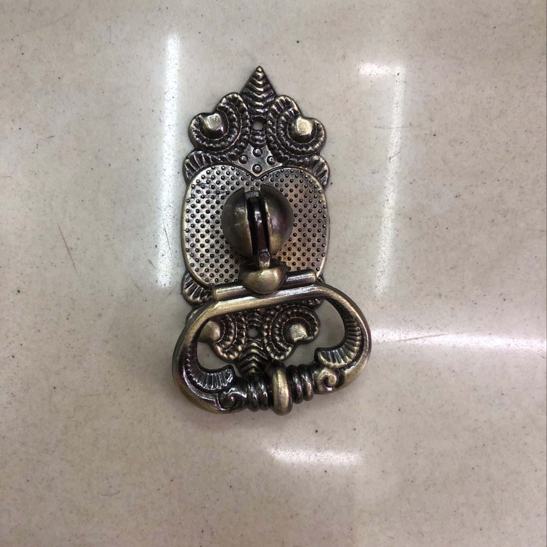 Lilacs hold hands in a bronze color