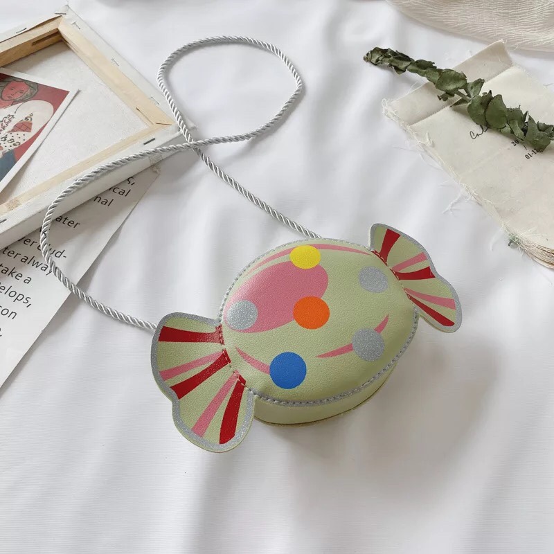 可爱糖果儿童斜挎包白底实物图