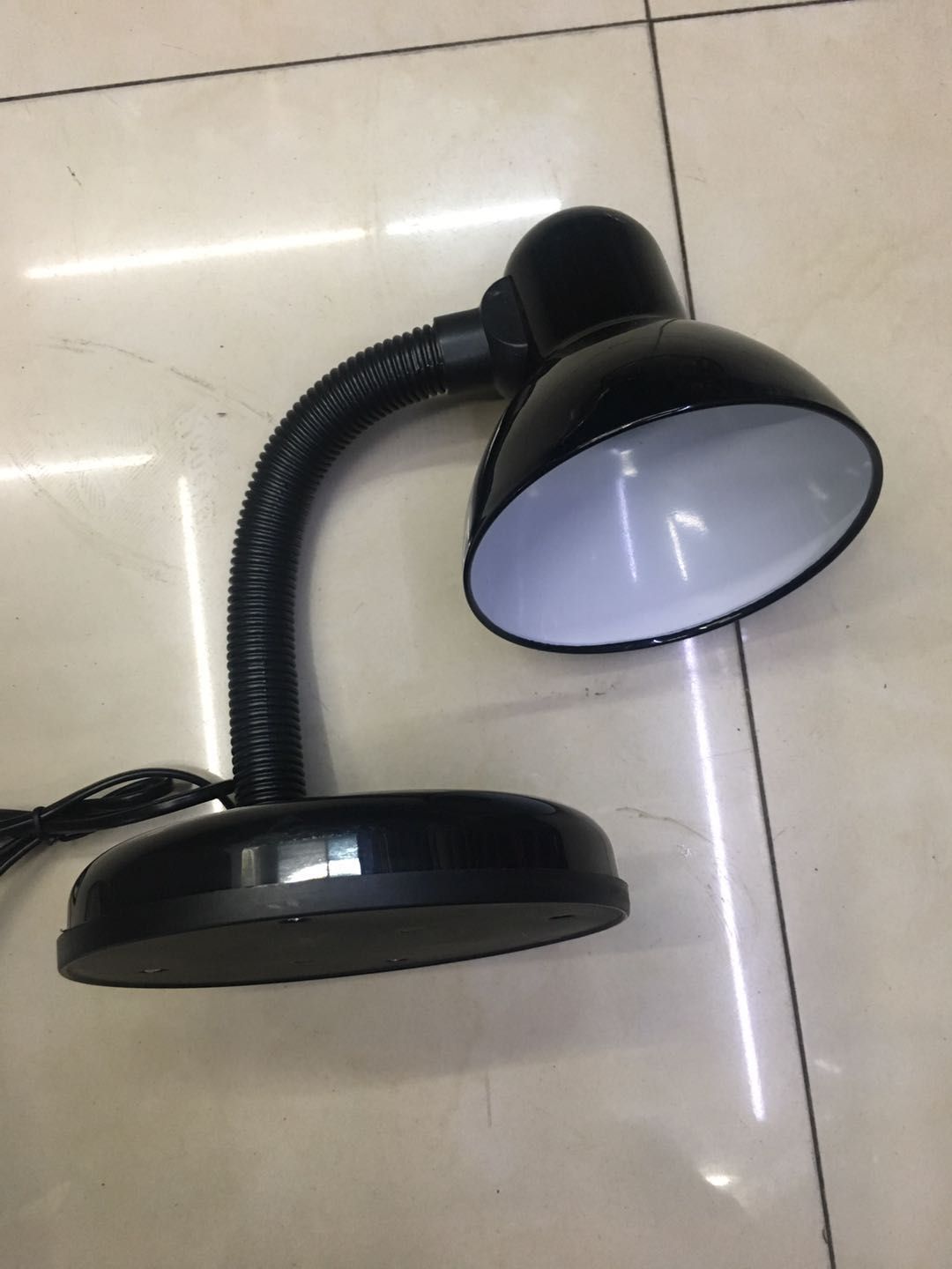 The 203 desk lamp is available in multiple colors and is sold directly by the manufacturer with complete qualifications. It meets both European and American standards