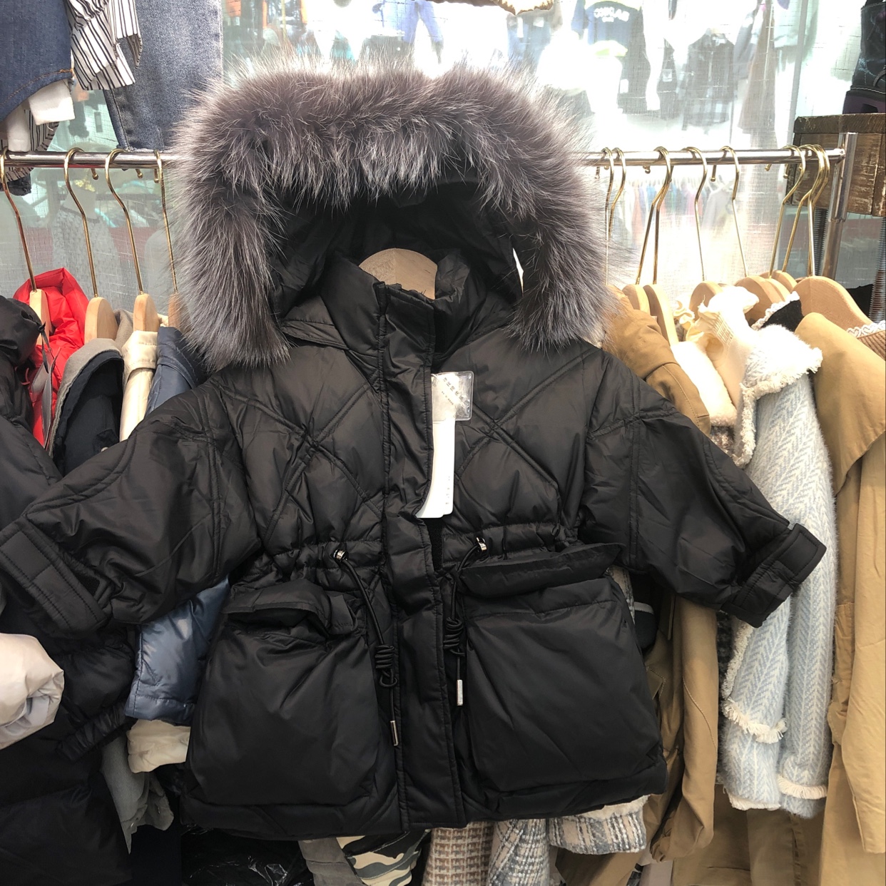Lady's down jacket with large fur collar thumbnail