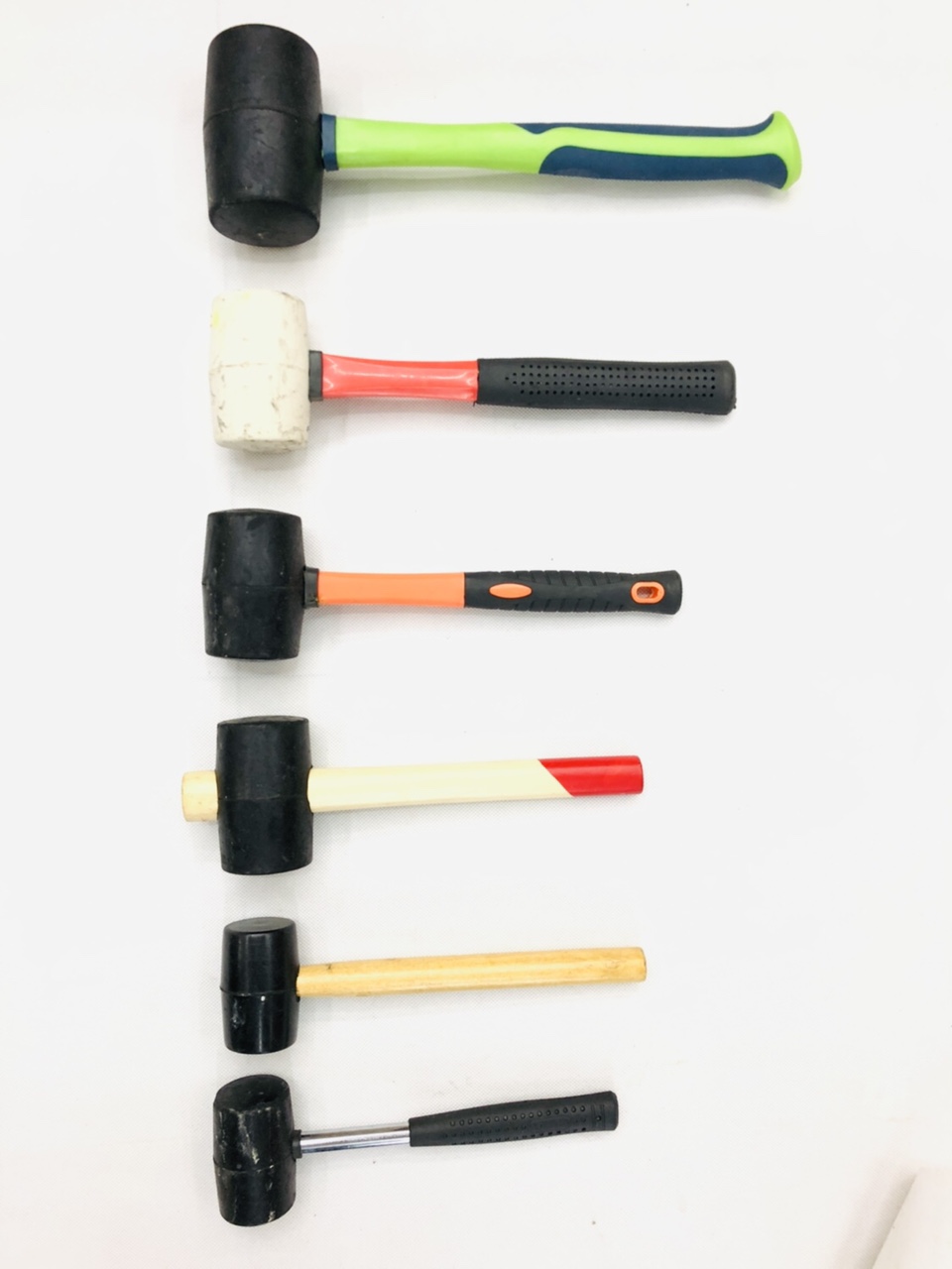 Rubber hammer with wood handle and plastic handle with rubber hammer with steel tube handle thumbnail