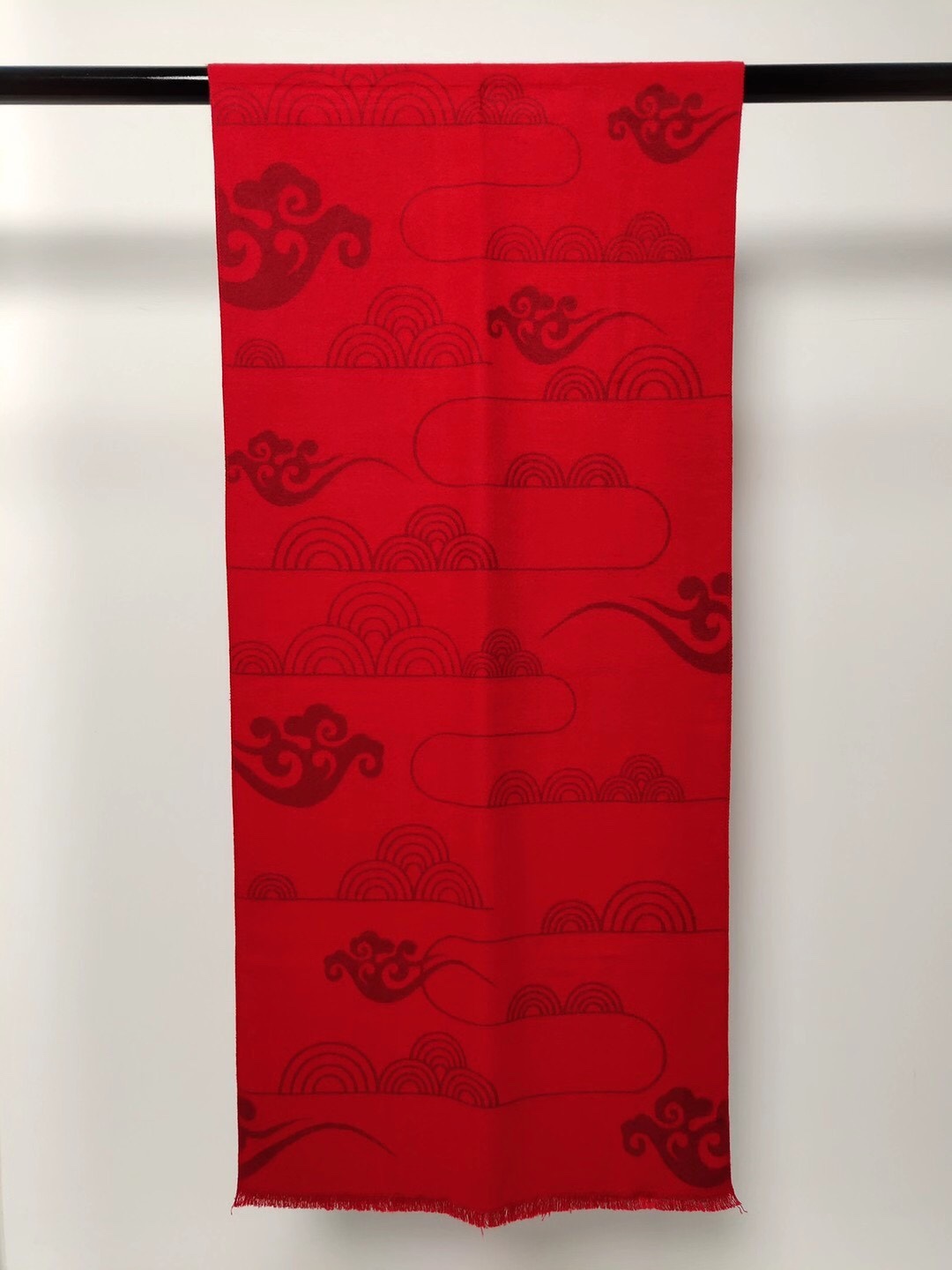 A bright red scarf details Picture