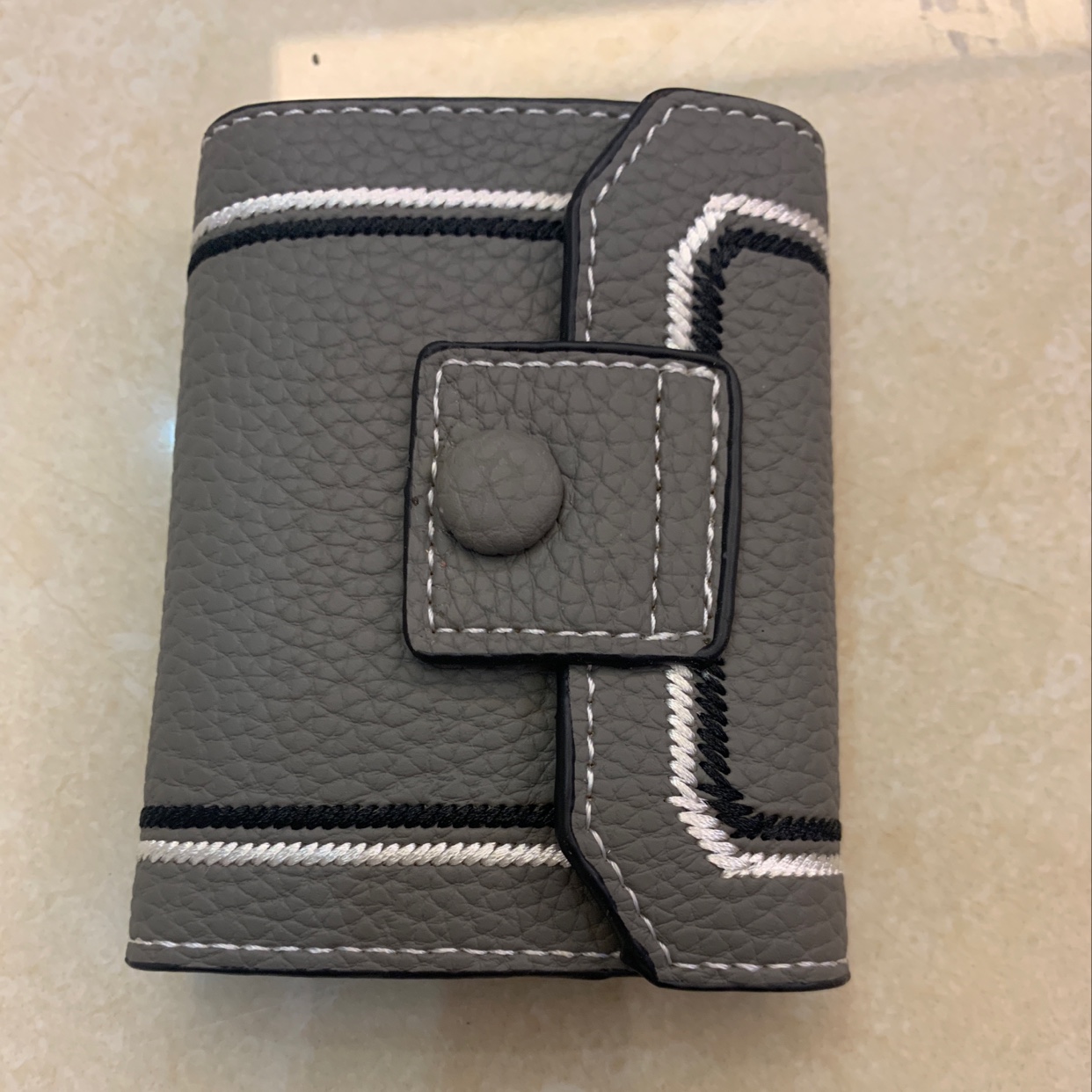 The new card case is grey details Picture