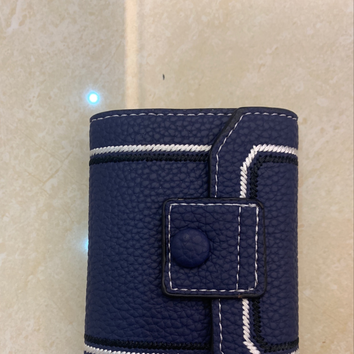 The new card case is in blue