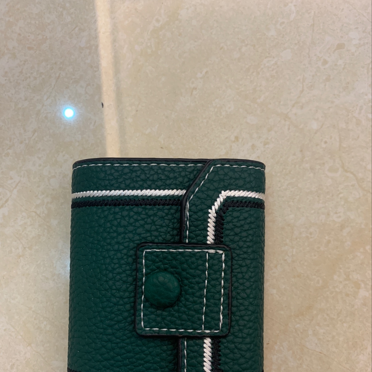 The new card case is green