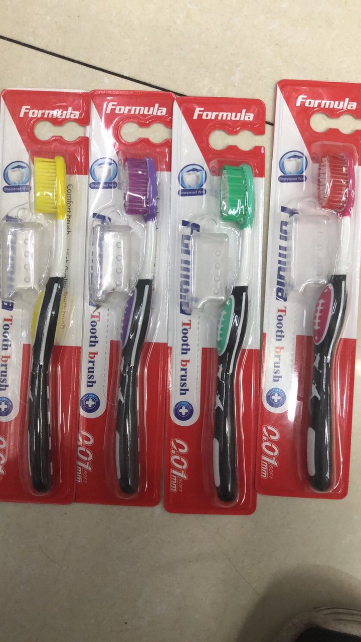 With a condom toothbrush thumbnail