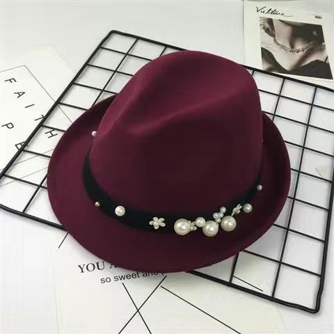 Pearl and woolen top hat