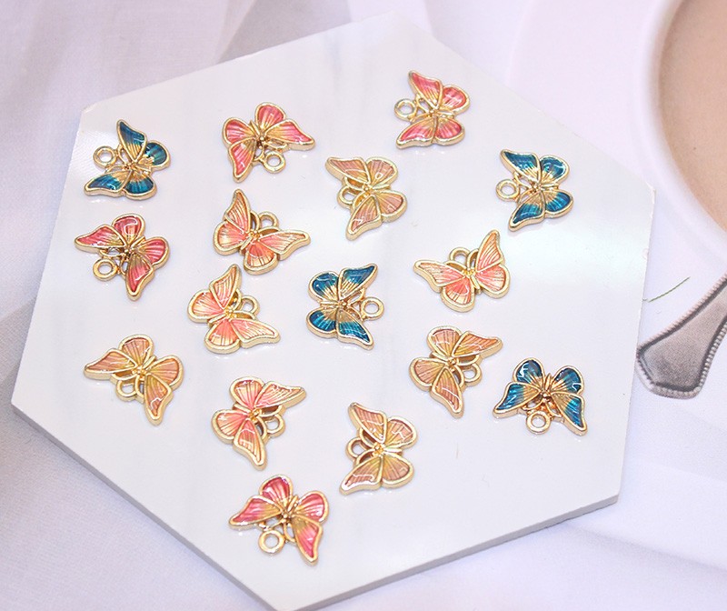 厂家直销DIY饰品配件 时尚滴油双色蝴蝶挂件 手链耳环耳夹小挂饰详情图3