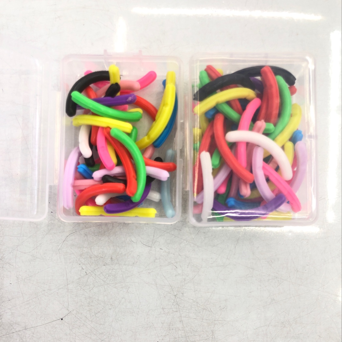A storage box for 36 spare eyelash curlers