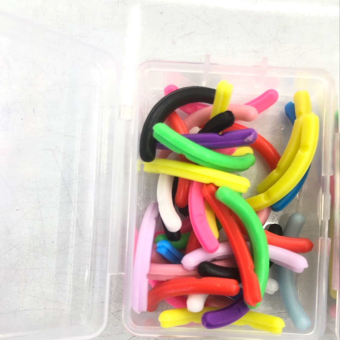 A storage box for 36 spare eyelash curlers details Picture