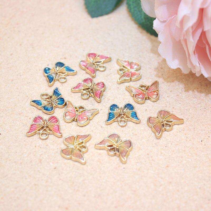 厂家直销DIY饰品配件 时尚滴油双色蝴蝶挂件 手链耳环耳夹小挂饰