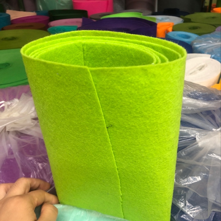 The felt fabric is emerald green