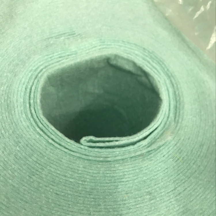 The felt fabric is light lake green