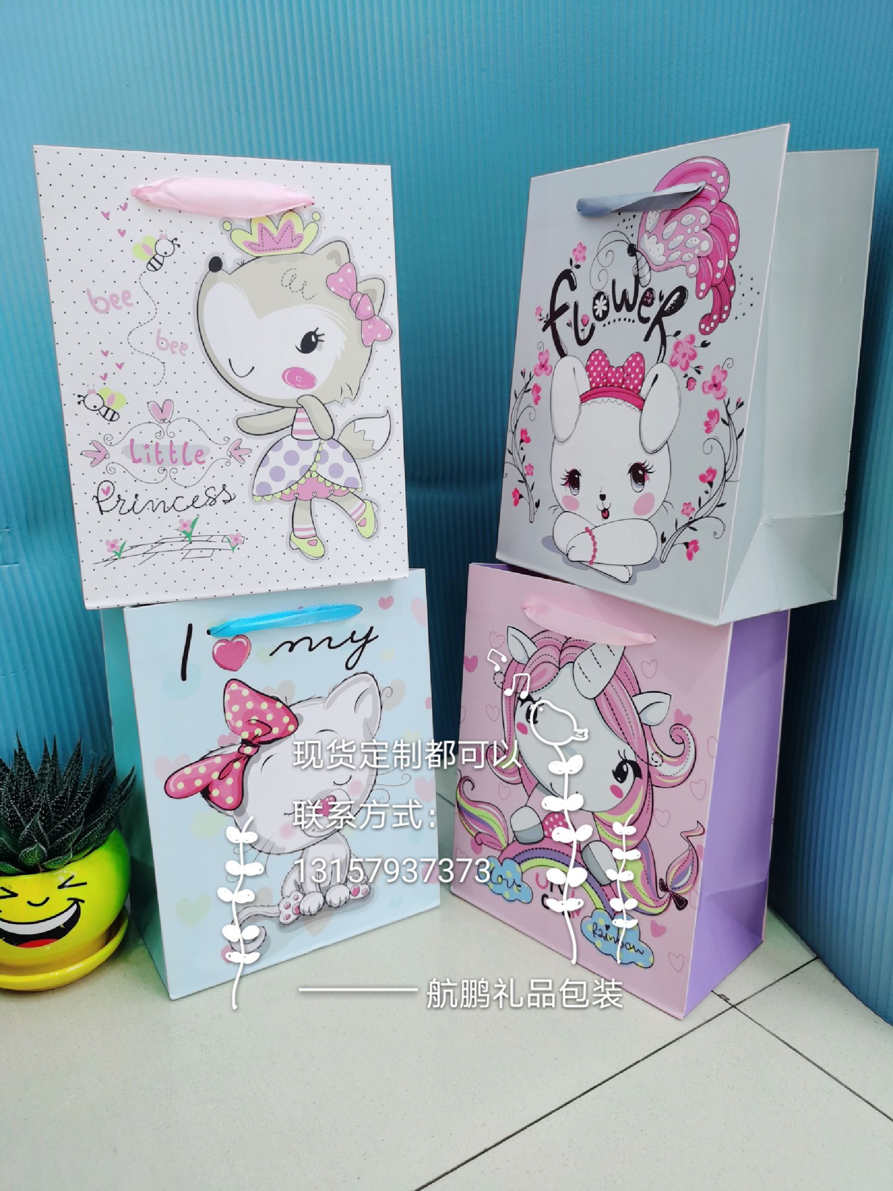 Customized paper bags from manufacturers, cartoon advertising handbags, custom-made shopping gift bags with logo printing, white card paper packaging bags full figure