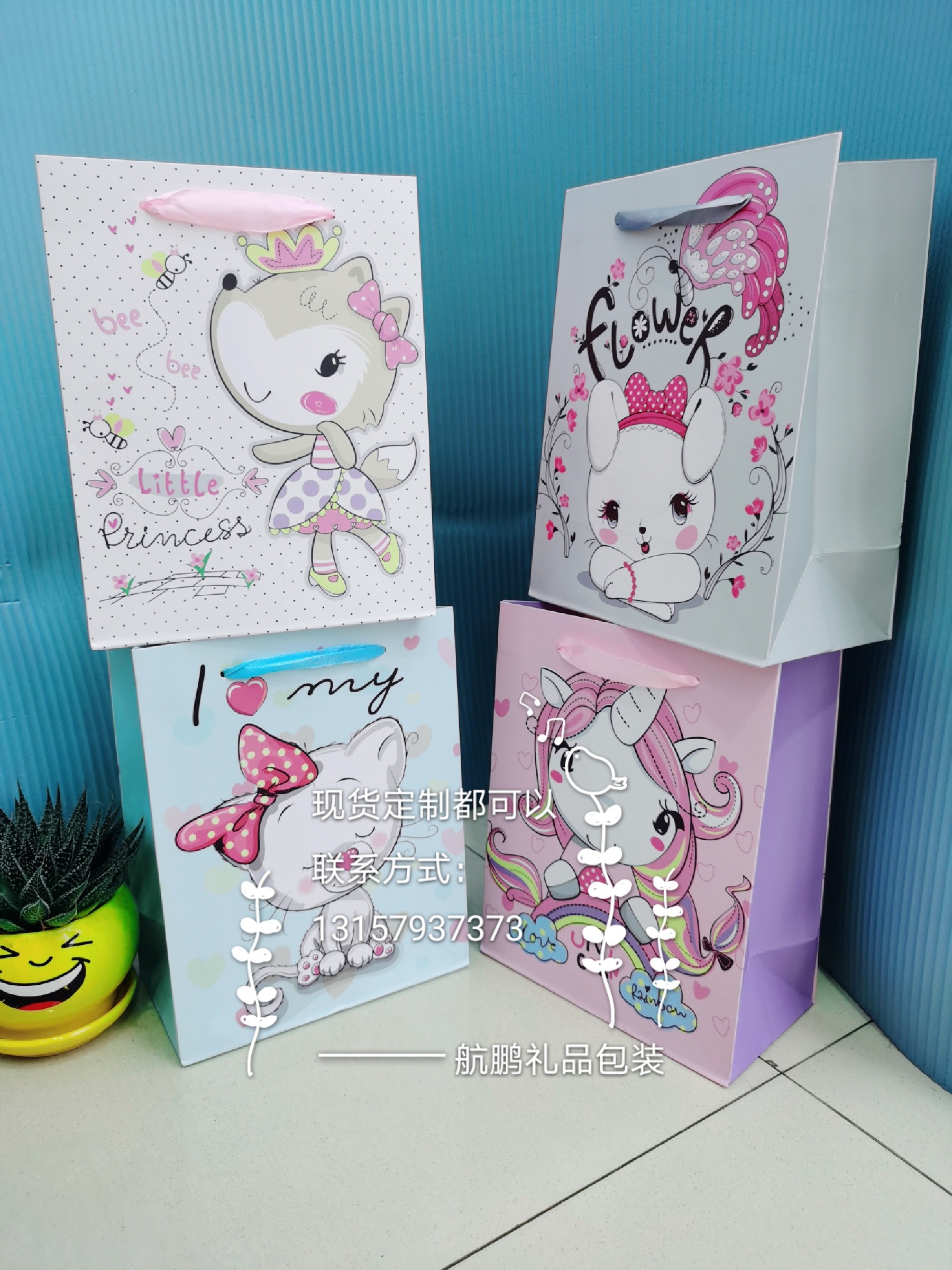 Customized paper bags from manufacturers, cartoon advertising handbags, custom-made shopping gift bags with logo printing, white card paper packaging bags undefined