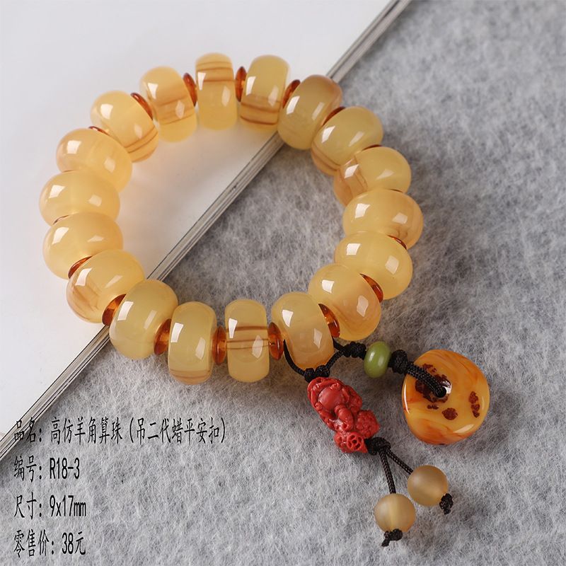Factory direct sales of high-quality imitation sheep horn bracelets, abacus beads, fashionable gifts, and popular accessories for scenic spots in Xizang. Wholesale details Picture