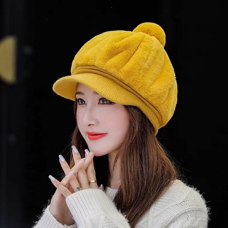 A Korean-style trendy and fashionable hat for women in autumn and winter, with thickened fleece and warmth, is a versatile winter accessory. It features a plush duck tongue knitted woolen cap detail image 4