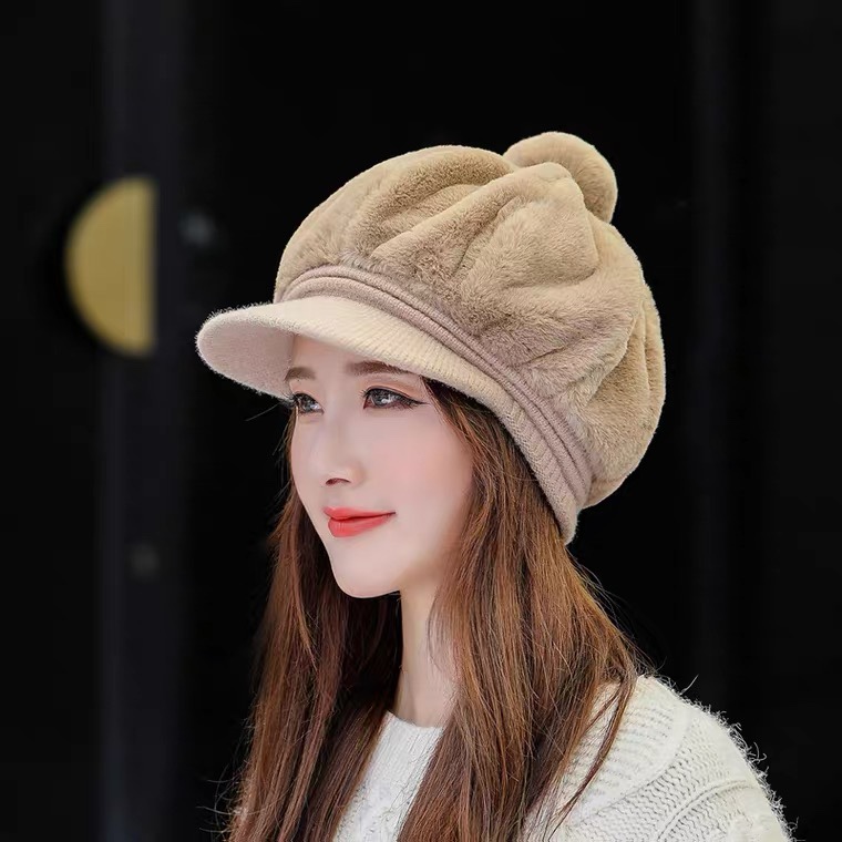 A Korean-style trendy and fashionable hat for women in autumn and winter, with thickened fleece and warmth, is a versatile winter accessory. It features a plush duck tongue knitted woolen cap