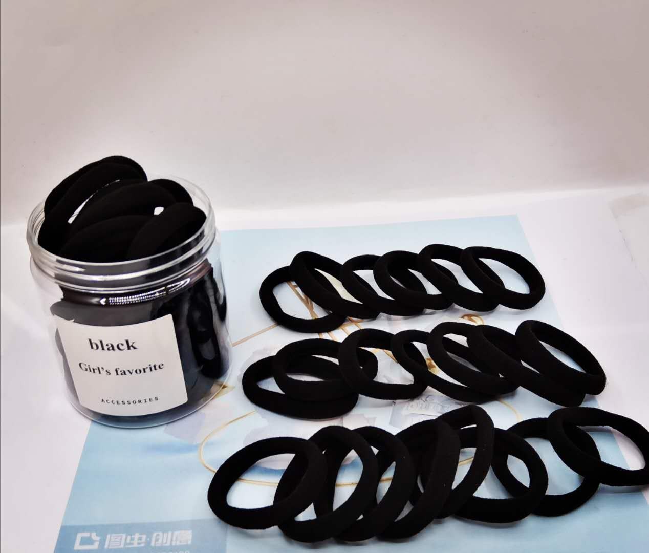 A medium-sized black towel ring set of 150 pieces, a Korean version of the popular and cute style, with high elasticity and no damage to hair detail image 4