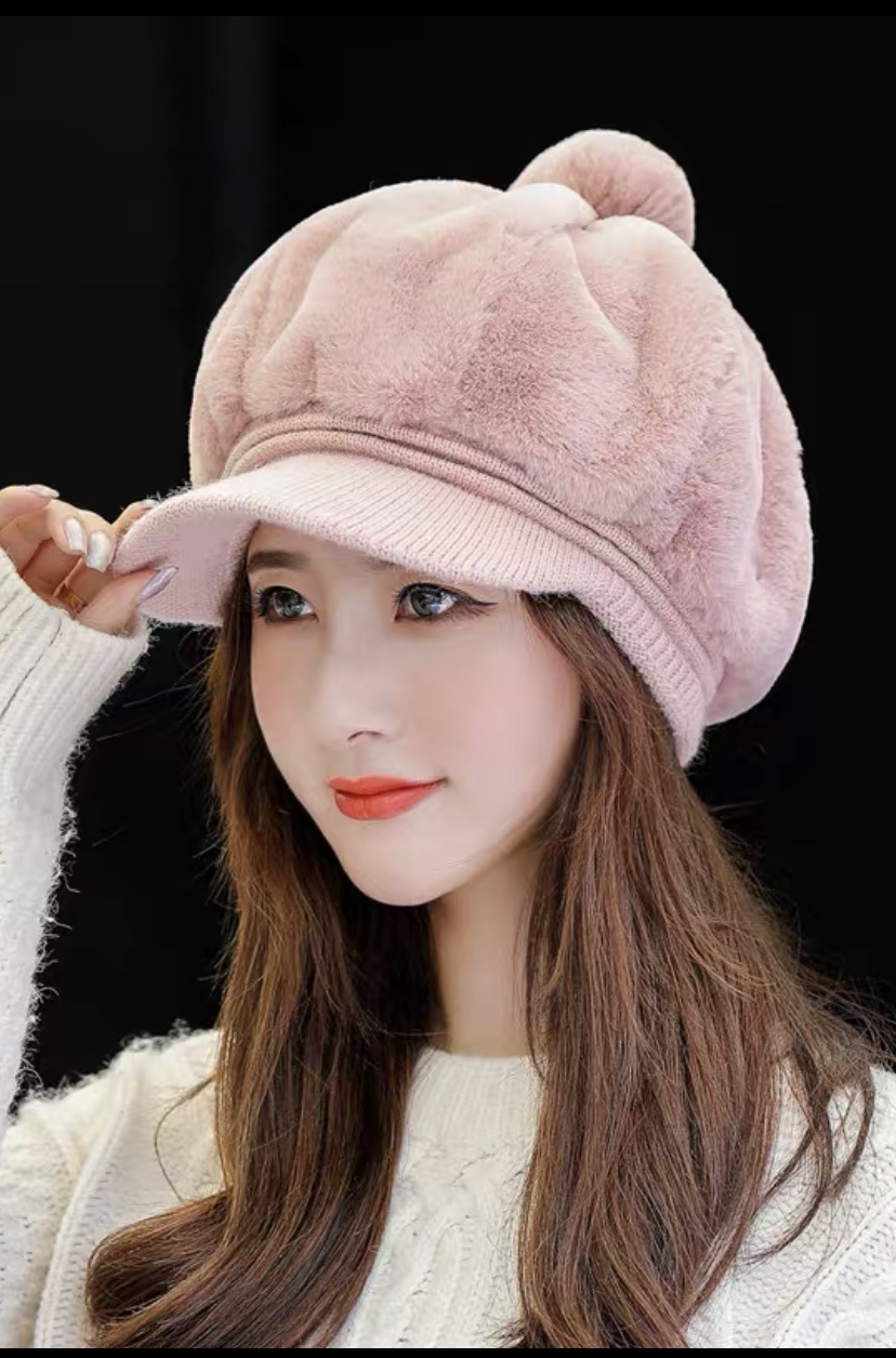 A Korean-style trendy and fashionable hat for women in autumn and winter, with thickened fleece and warmth, is a versatile winter accessory. It features a plush duck tongue knitted woolen cap detail image 6