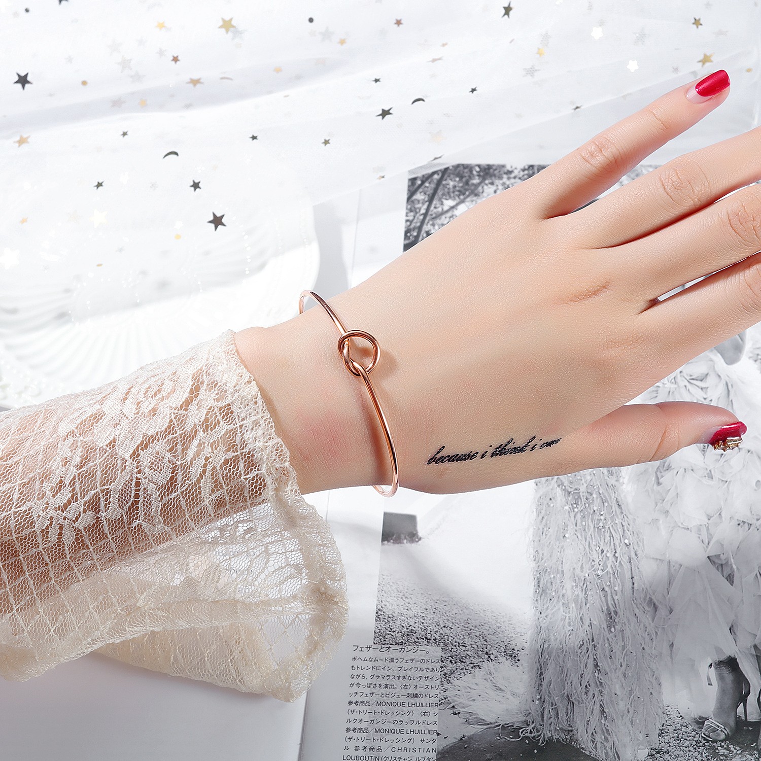 Hot-selling fashionable Instagram niche design knotted heart-shaped titanium steel bracelet for women, simple and versatile open bracelet detail image 6