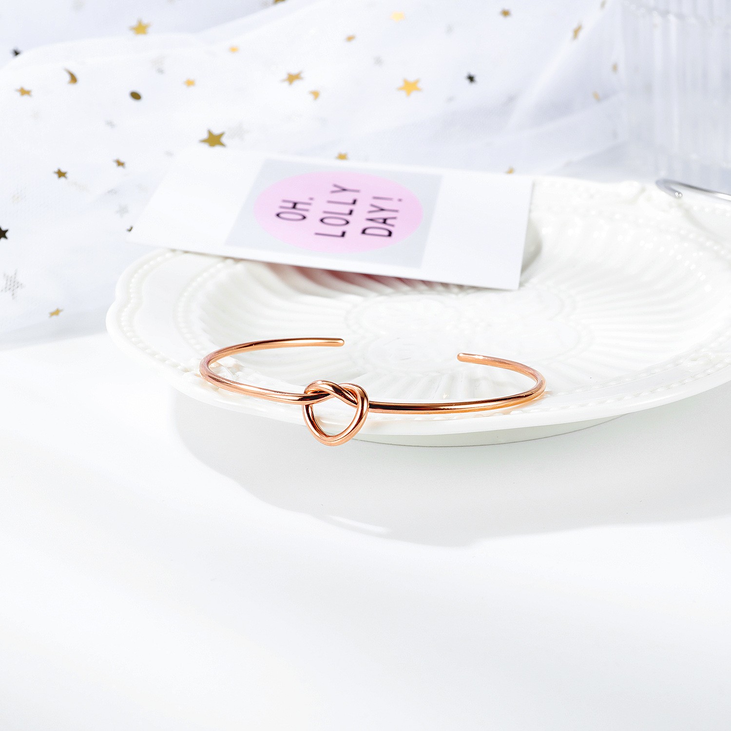 Hot-selling fashionable Instagram niche design knotted heart-shaped titanium steel bracelet for women, simple and versatile open bracelet detail image 4