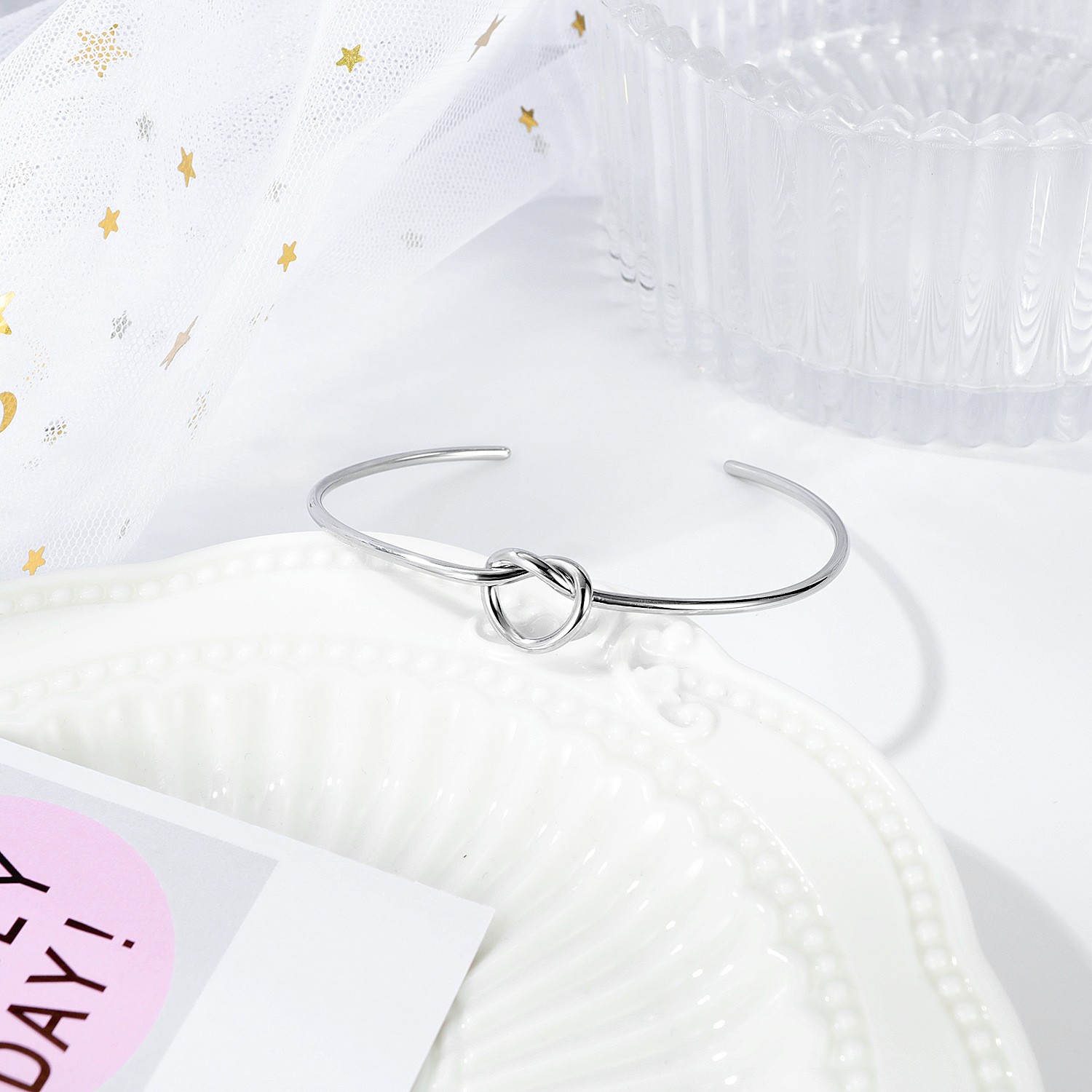 Hot-selling fashionable Instagram niche design knotted heart-shaped titanium steel bracelet for women, simple and versatile open bracelet detail image 5