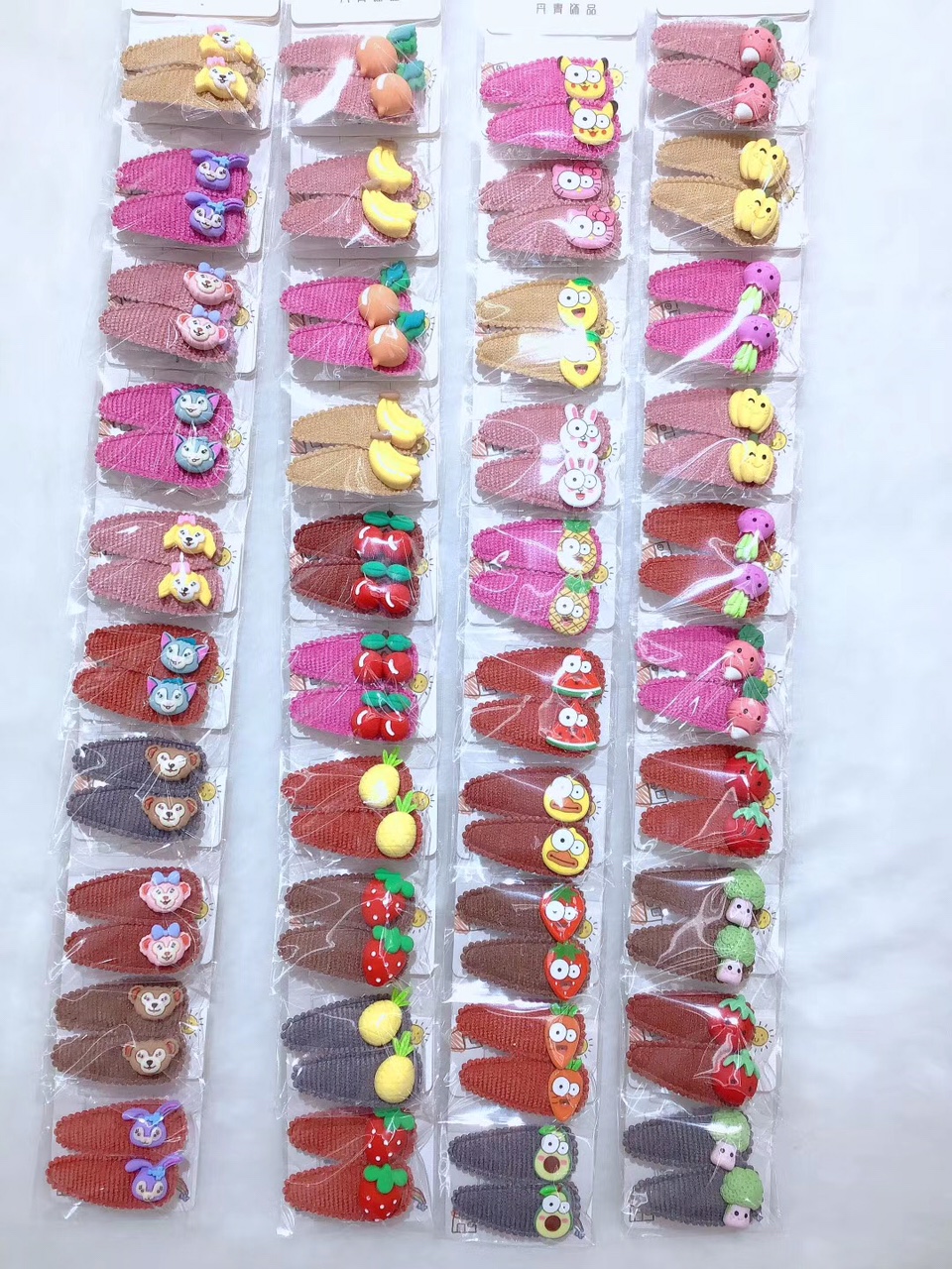 Children's pair of cartoon fruit fabric clips