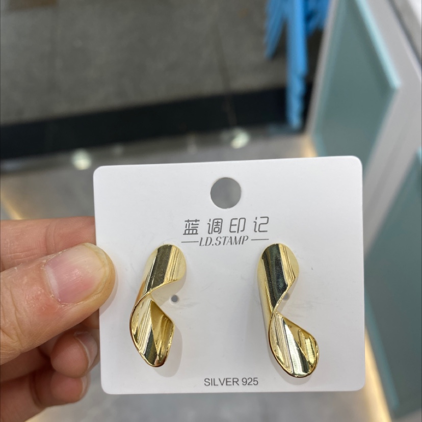 Character metal stud earrings thumbnail