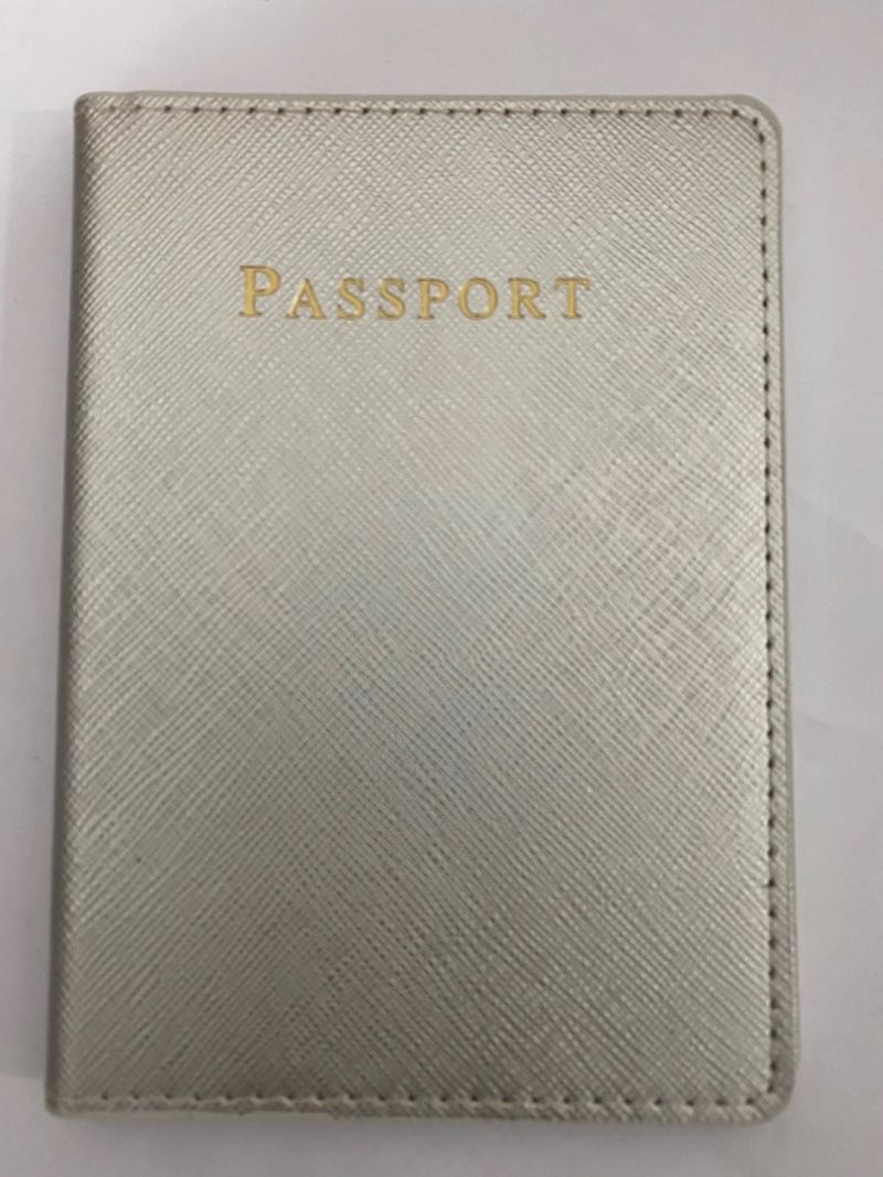 Cross-patterned passport cover undefined