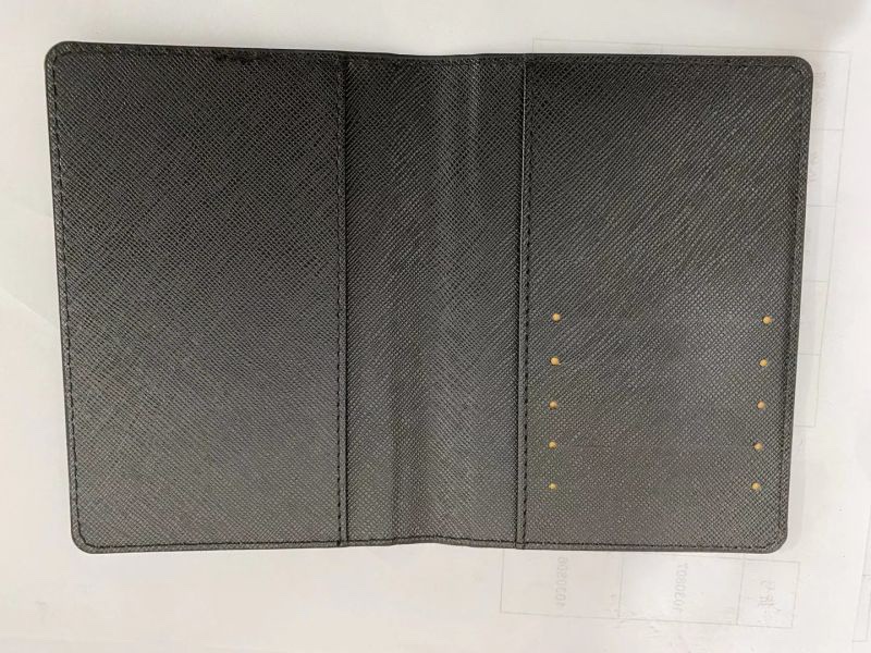 Cross-patterned passport cover undefined
