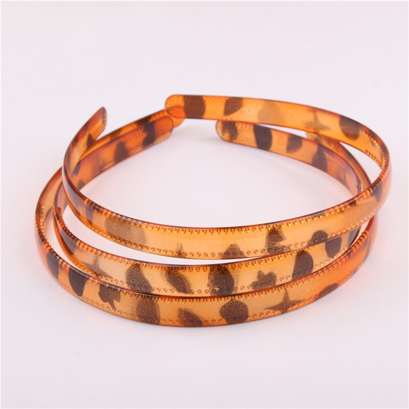 Factory direct plastic spray paint day vintage leopard print 1.2cm simple headband buckle with teeth pressure hair band haircard girls all match personality headwear thumbnail