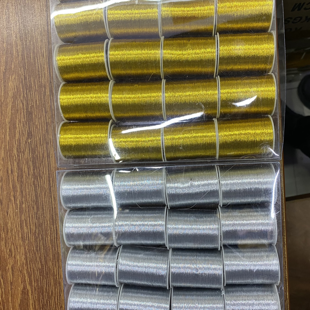 Imported gold and silver thread colored silk thread in a box of 20 rolls thumbnail