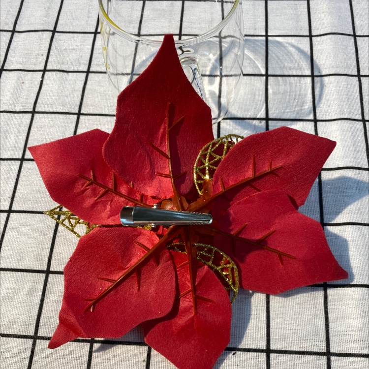 A combination of bright red velvet and Christmas flowers detail image 1
