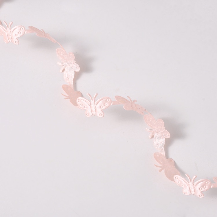 1.5cm butterfly ultrasonic embossed webbing factory direct sales and wholesale of handicrafts, gifts, decorative ribbons, small bow ribbons, accessories and webbing Application Scenario
