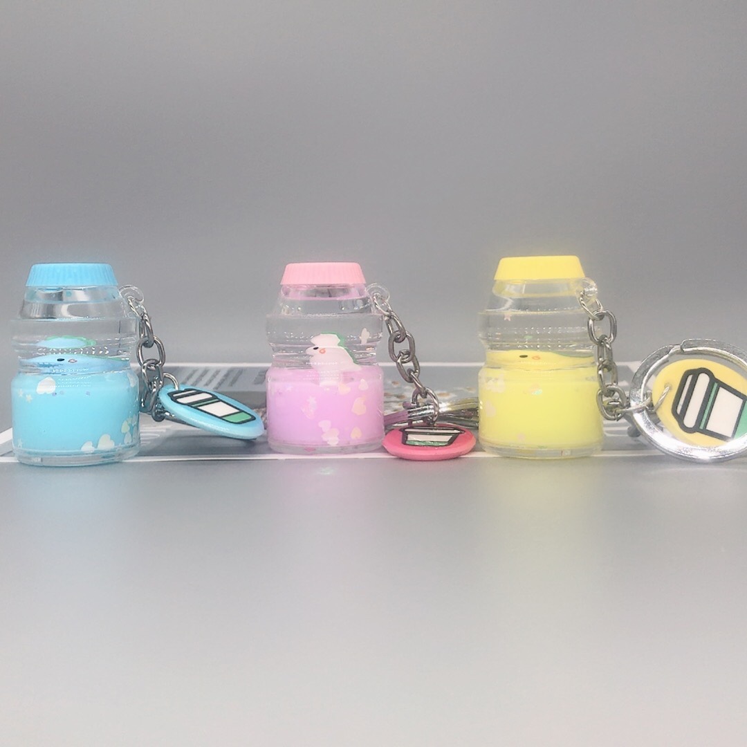 Quicksand dinosaur baby bottle key chain thumbnail