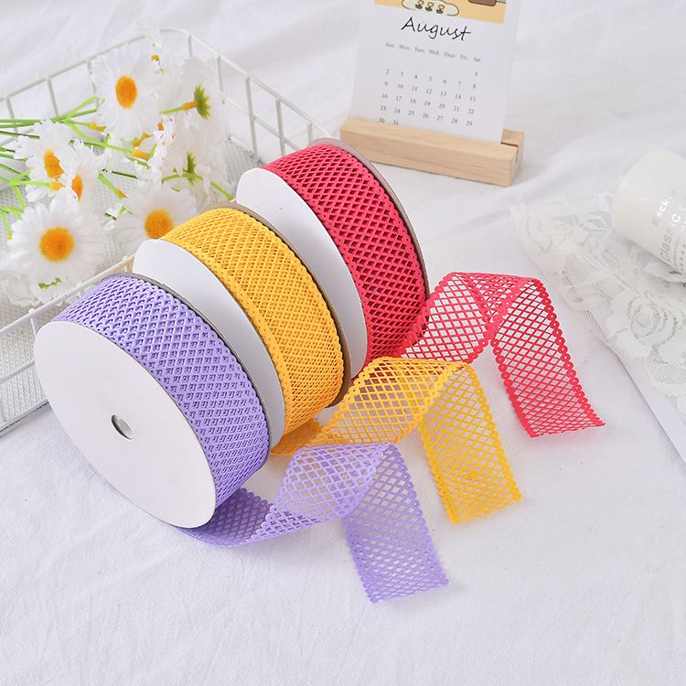 3.8cm grid hollowed-out ultrasonic embossed tape, factory direct sales and wholesale of gifts, handicrafts, hair accessories, decorative small bows, ribbons, small bows, ribbons details Picture