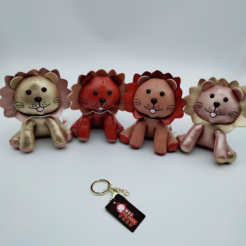 Creative leather Lion Keychain Plush leather Sun Lion doll pendant Car decoration gift key ring claw doll