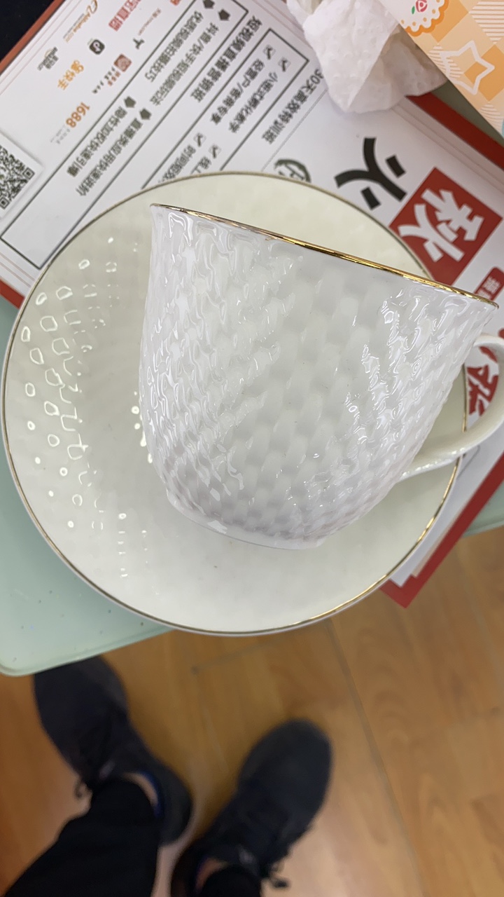 Six cups and six plates