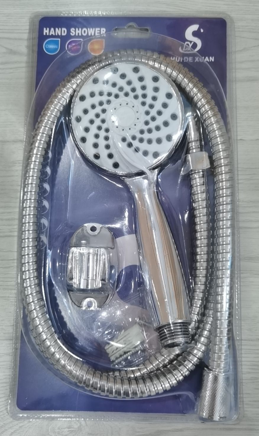 Handheld shower head set with vacuum forming and hose vacuum forming