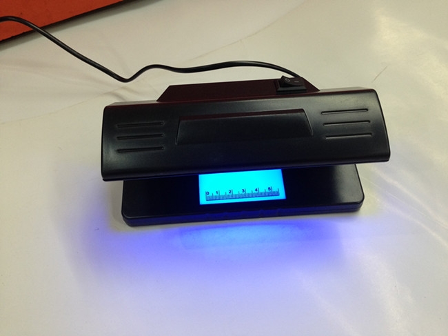 验钞机HX-318小型紫光荧光验钞灯紫外线验钞仪多国货币美元验钞机详情图4