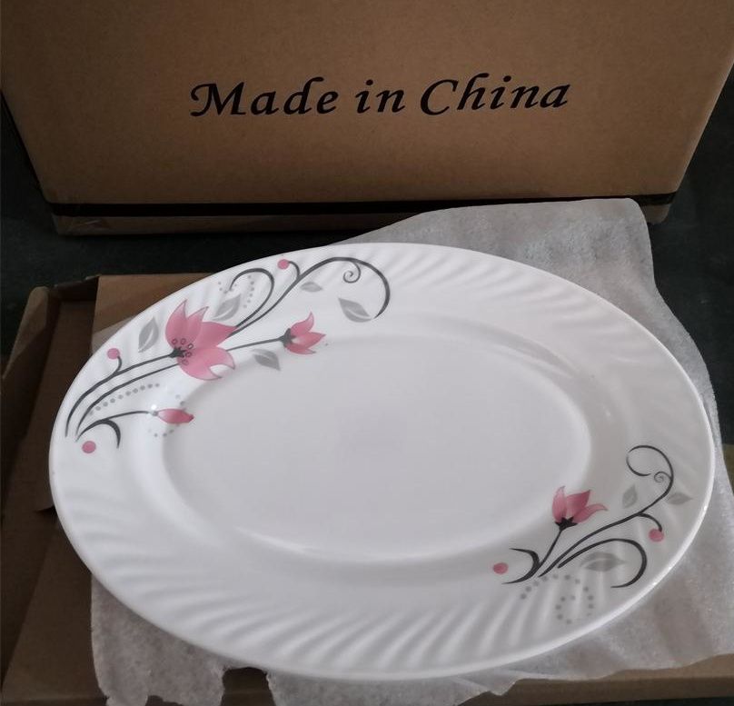 Yiwu Quality Fish plate, glass plate, heat-resistant glass, milky white plate, waist plate - 12-inch waist plate oval plate Application Scenario